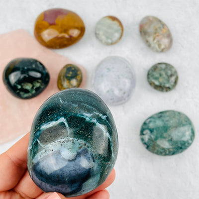 Ocean Jasper Palm Stone in hand for size reference 