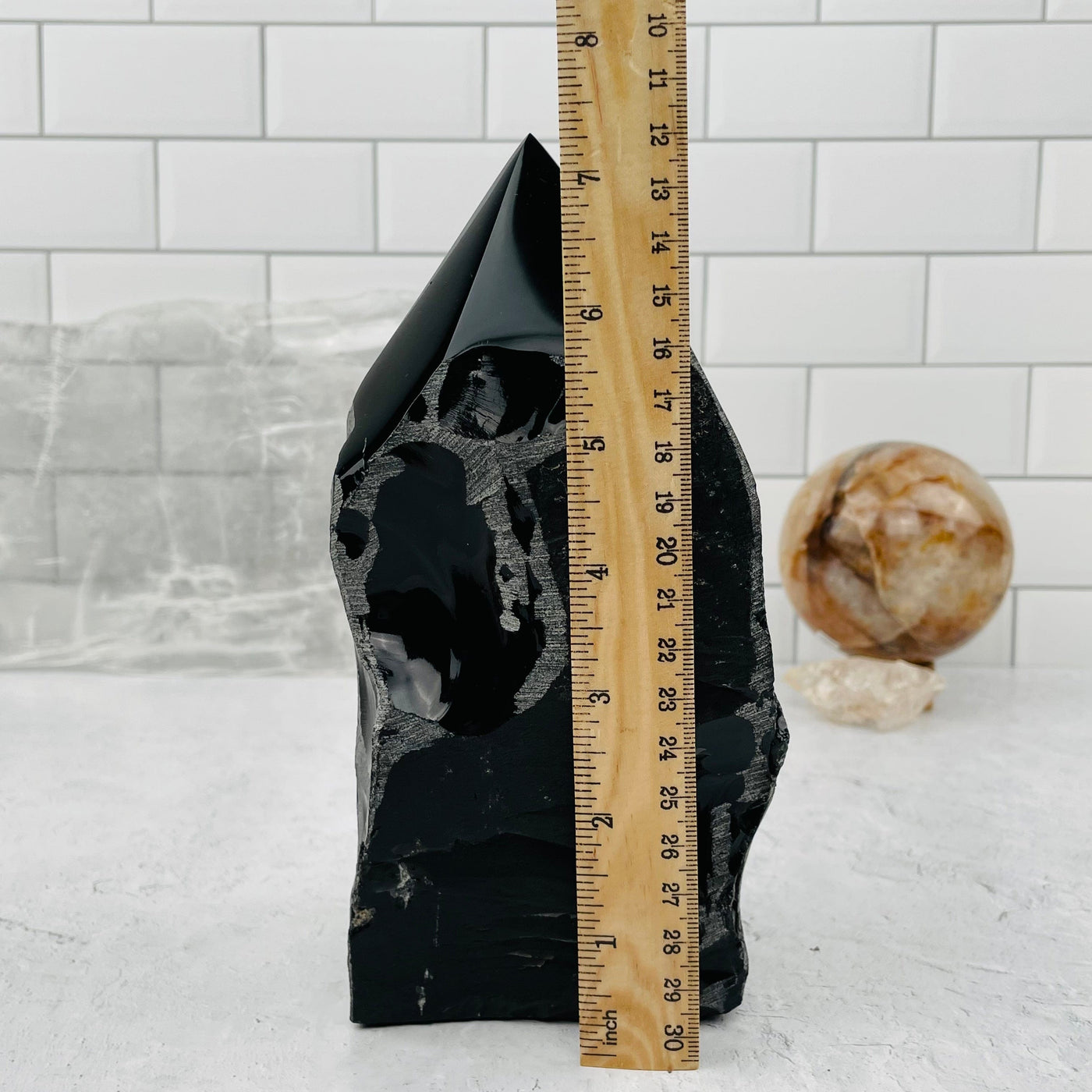 Black Obsidian Large Semi Polished Point with a ruler for size reference