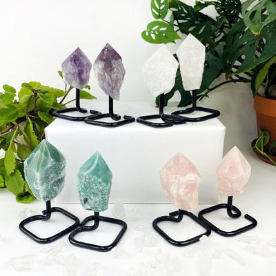 Semi Polished Points on Metal Stands available in these stones: amethyst, crystal quartz, rose quartz and green quartz