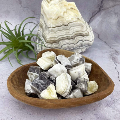 Mexican onyx stones displayed in a heart shape bowl bowl (not included).