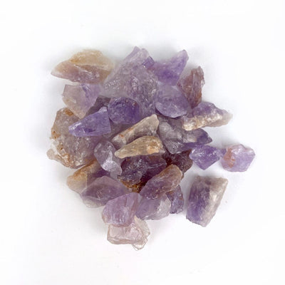 Amethyst Stones  in a pile, approximately 150grams, 1 bag