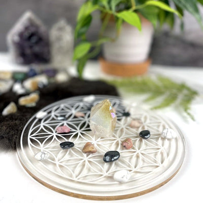 Crystal Grid Flower of Life Acrylic Grid - 2 sided - White side showing with crystals on it