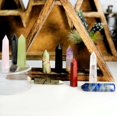 Gemstone Pencil Polished Points displayed on and by wooden triangle