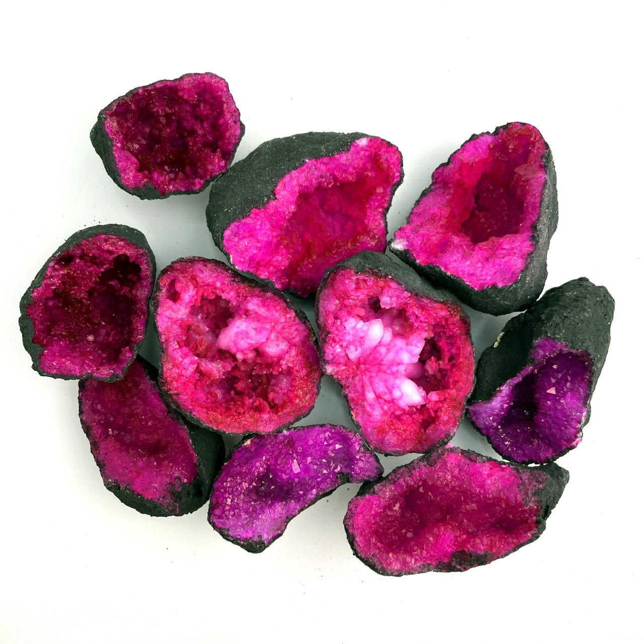A pile of opened Hot Pink Color Dyed Geodes