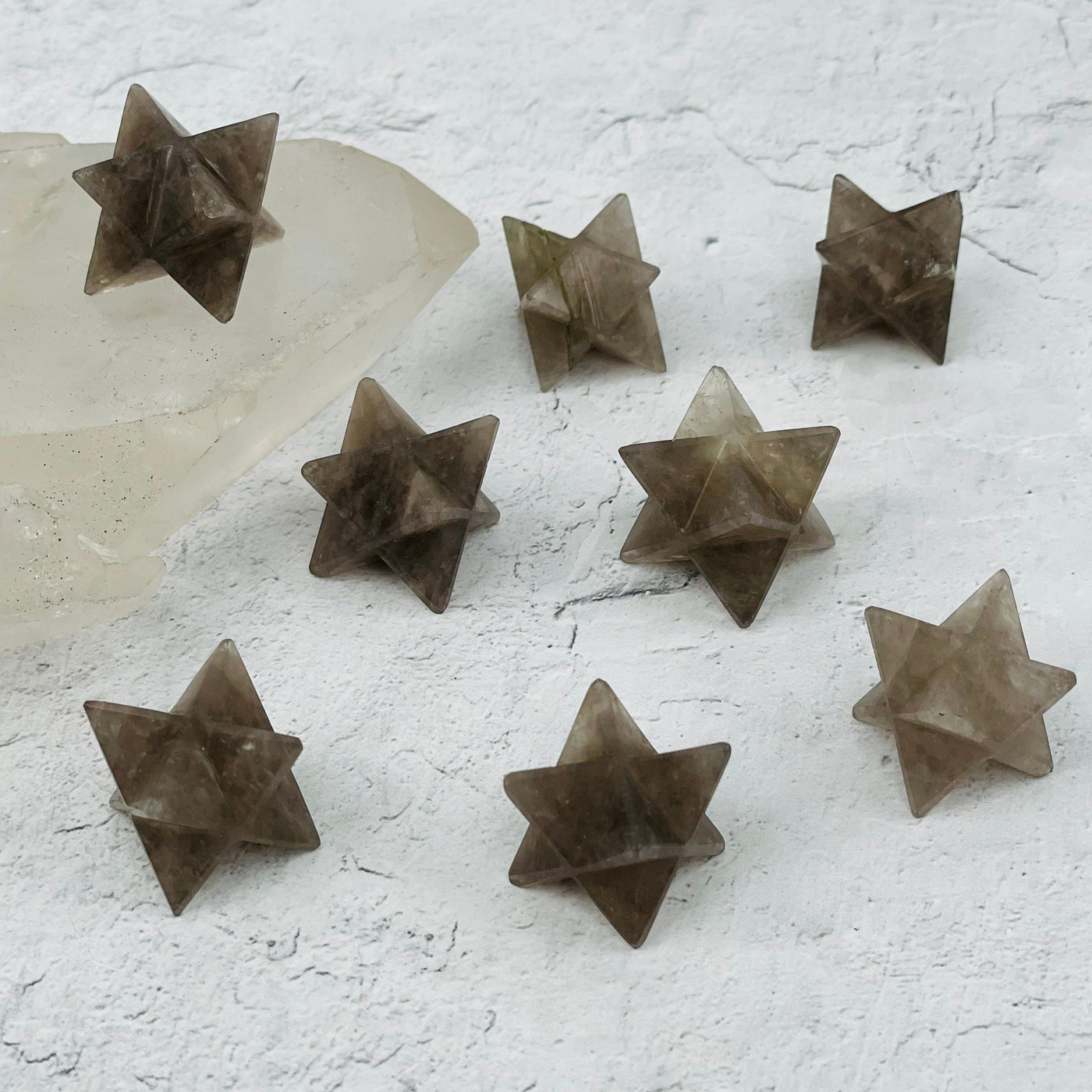 Smoky Quartz Merkaba Stars displayed to show the differences in the sizes and color shades 