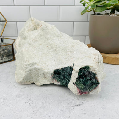 Watermelon Tourmaline cluster displayed as home decor 