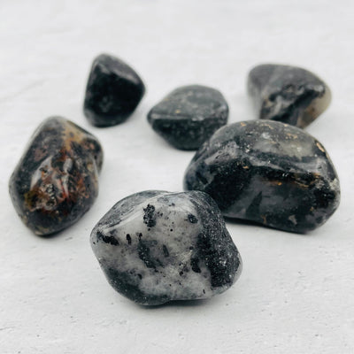 close up of the details on the black tourmaline tumbled stones 