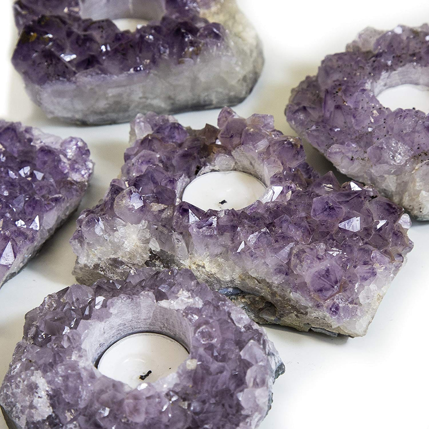 Natural Amethyst Crystal Candle Holders - 5 on a table with close up