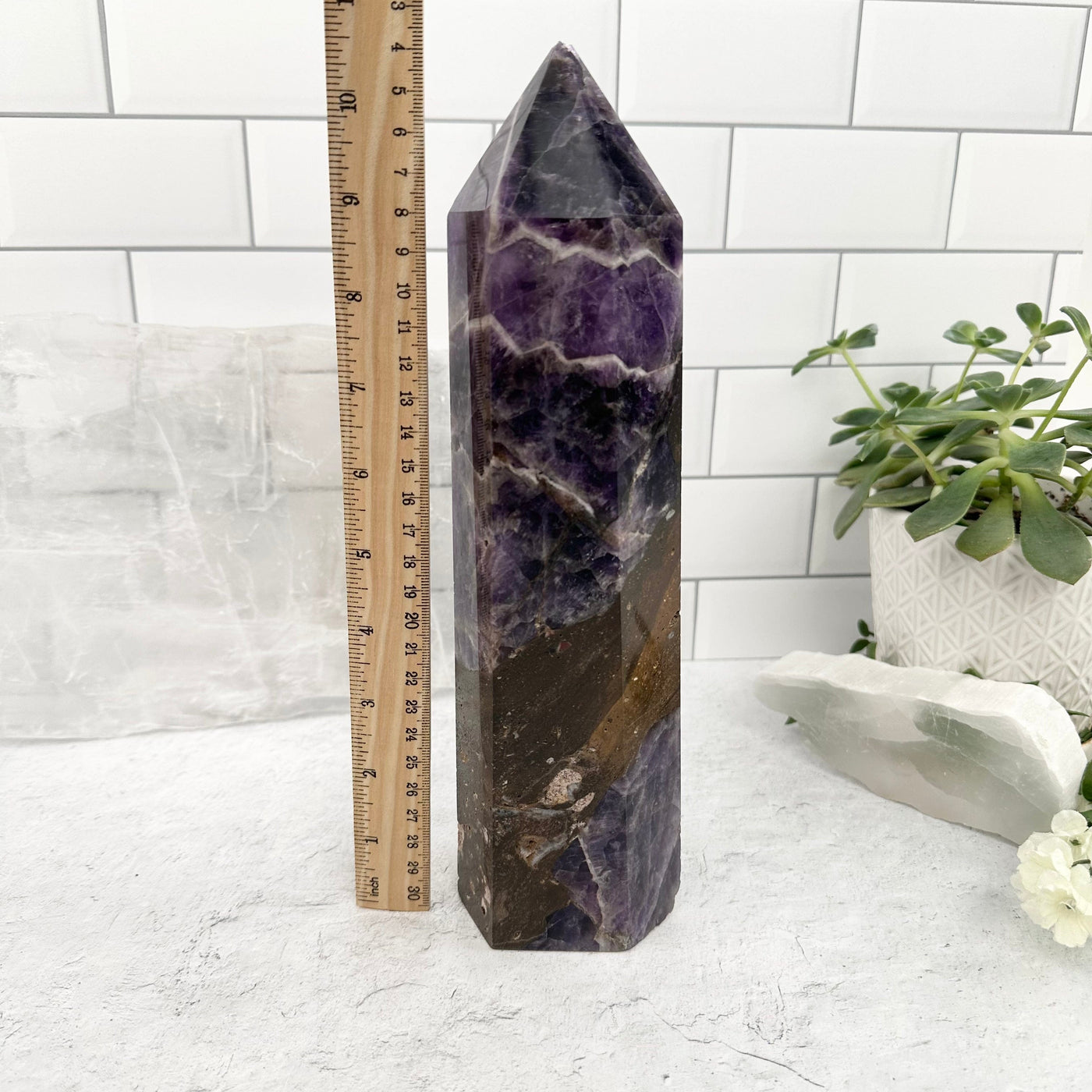 Chevron Amethyst Polished Point - with ruler for size reference 