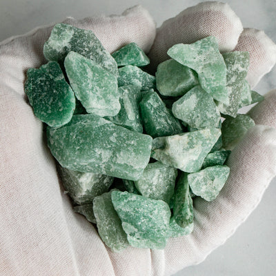Green Quartz Stones in a hand up close