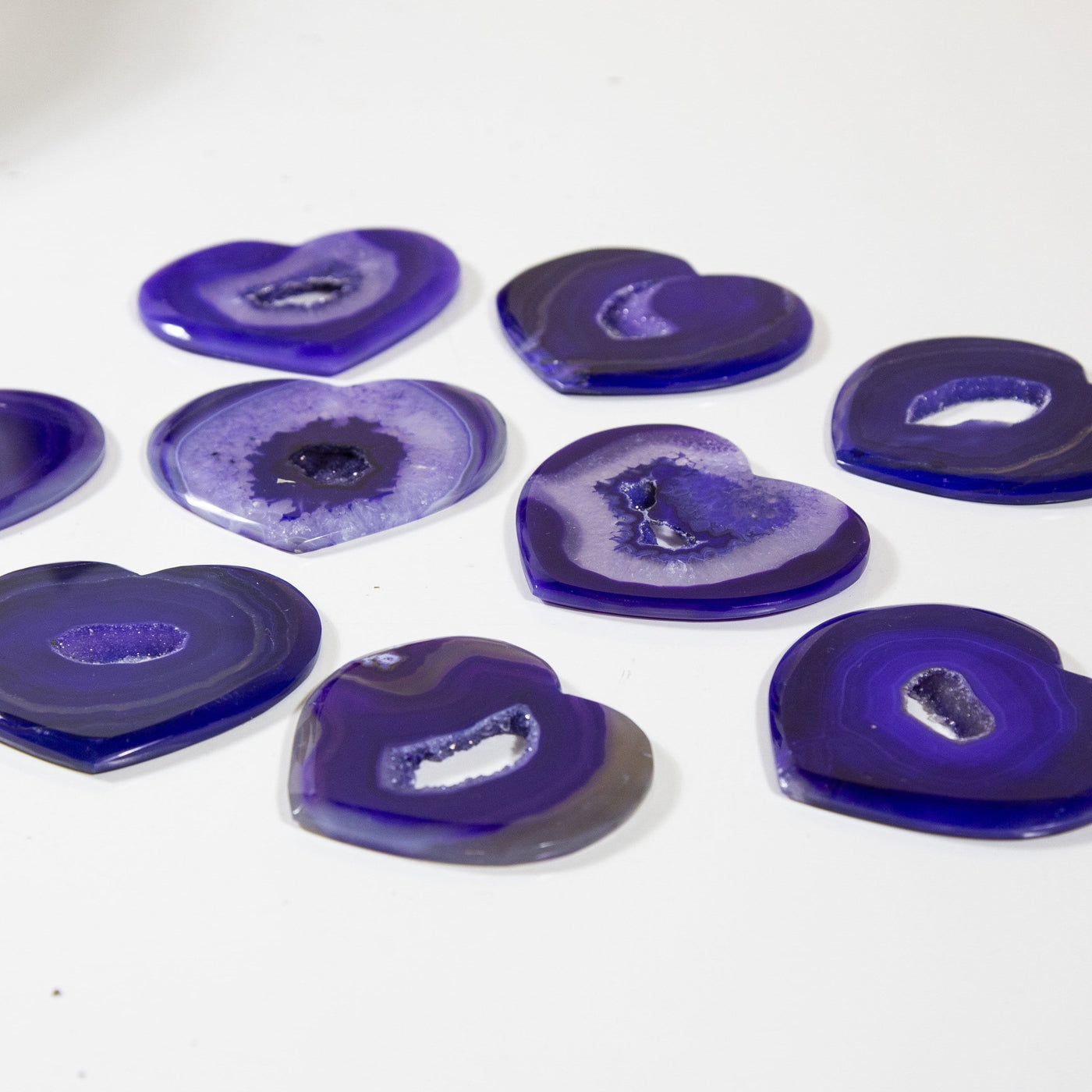purple agate hearts on white background