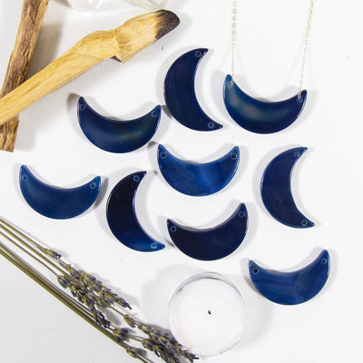 blue agate crescents on a table