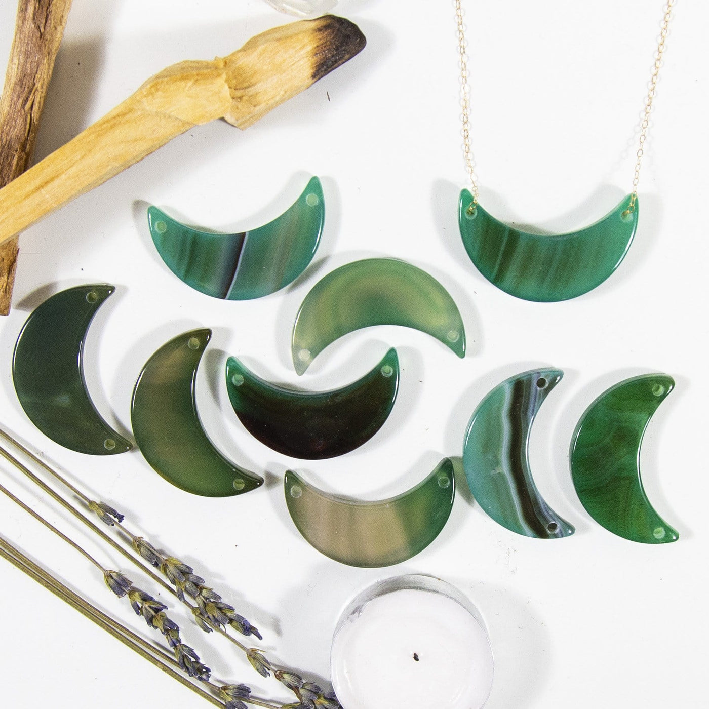 green agate crescents on a table