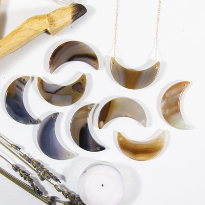 natural agate crescents on a table