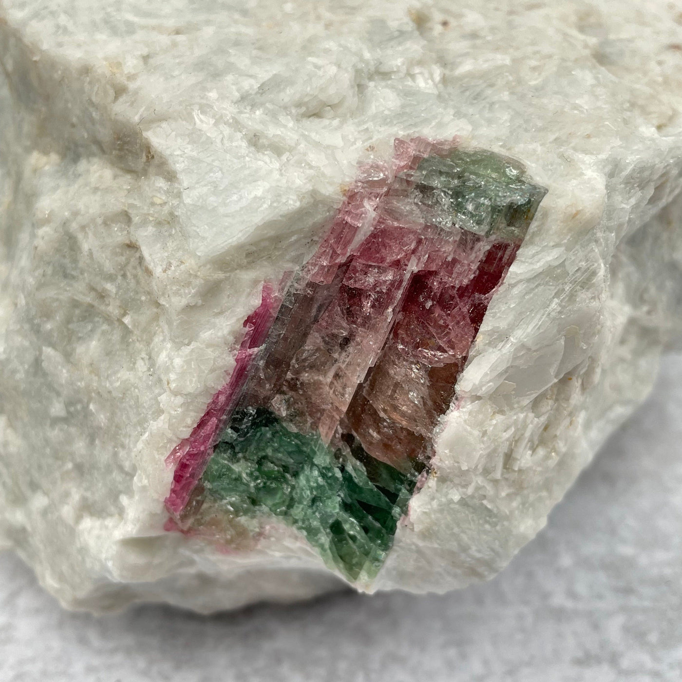 close up of the tourmaline rod growing through the stone 
