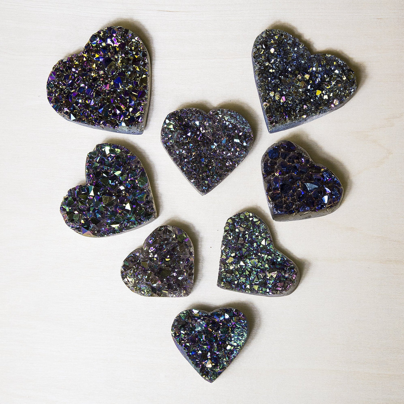 close up view of several titanium hearts on a light background