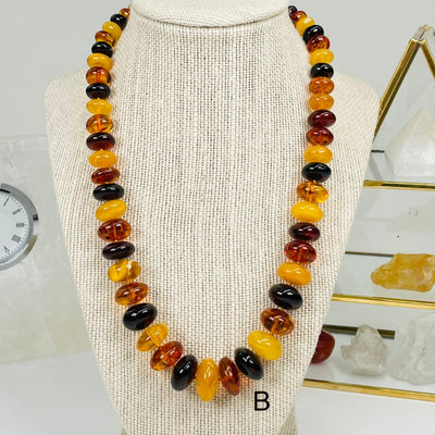 option B displayed to show the differences in the bead sizes and colors