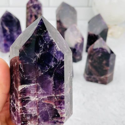 close up of the details on this purple amethyst point