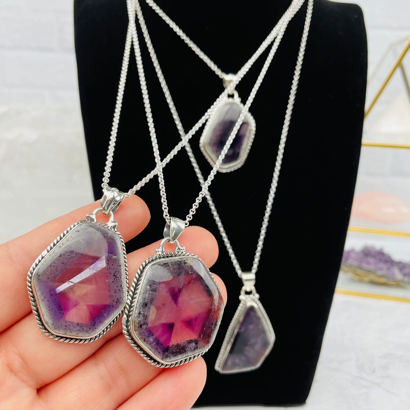 Trapiche Amethyst with Matrix Necklace in hand for size reference 