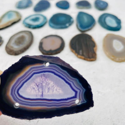 close up of the drilled agate slices. these come triple drilled 
