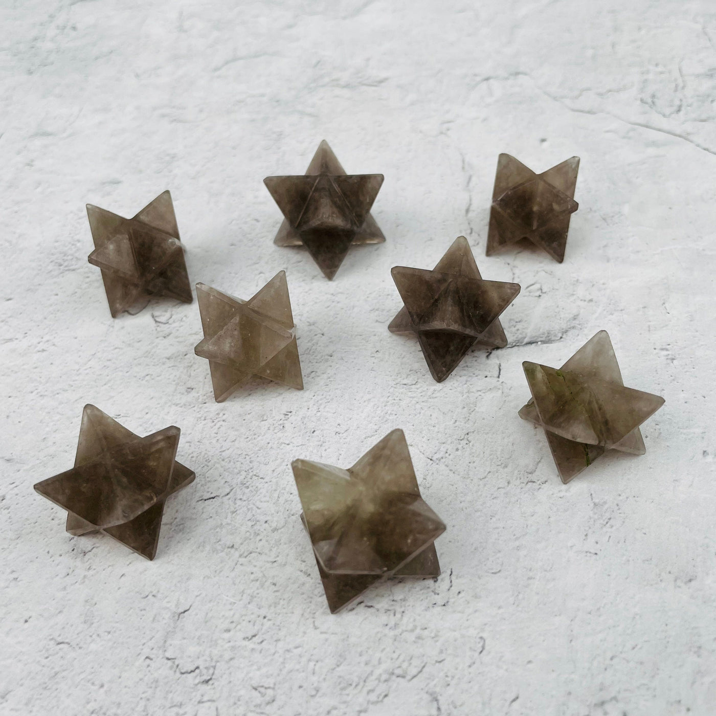 Smoky Quartz Merkaba Stars displayed to show the differences in the sizes and color shades