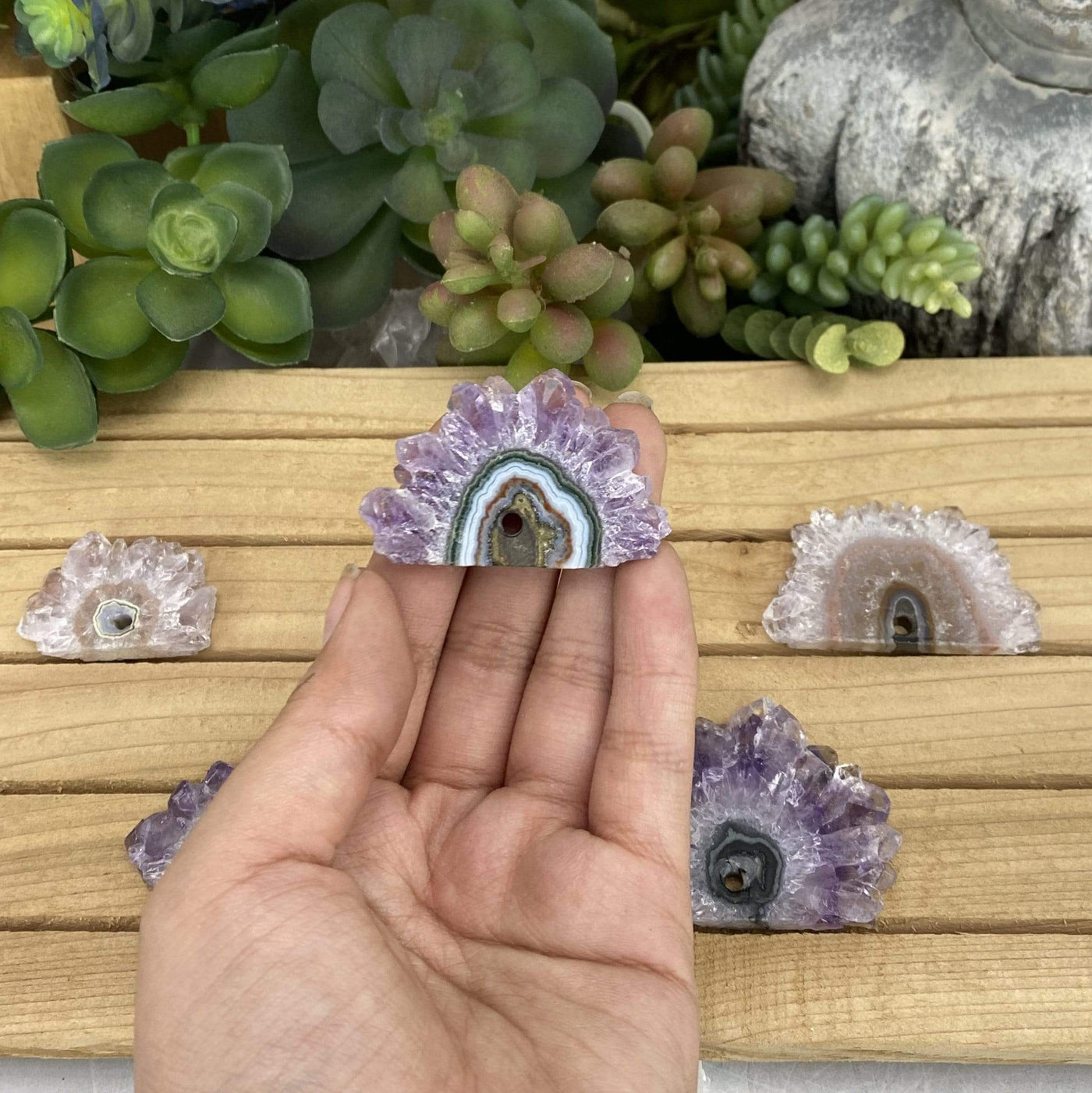 Amethyst Stalactite Slices - Single Drill Hole with #2 in a hand for size reference