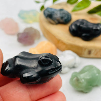 close up of the details on the gemstone frogs