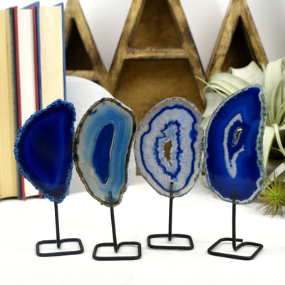 Four of the blue agate on metal stand are being shown in this picture.