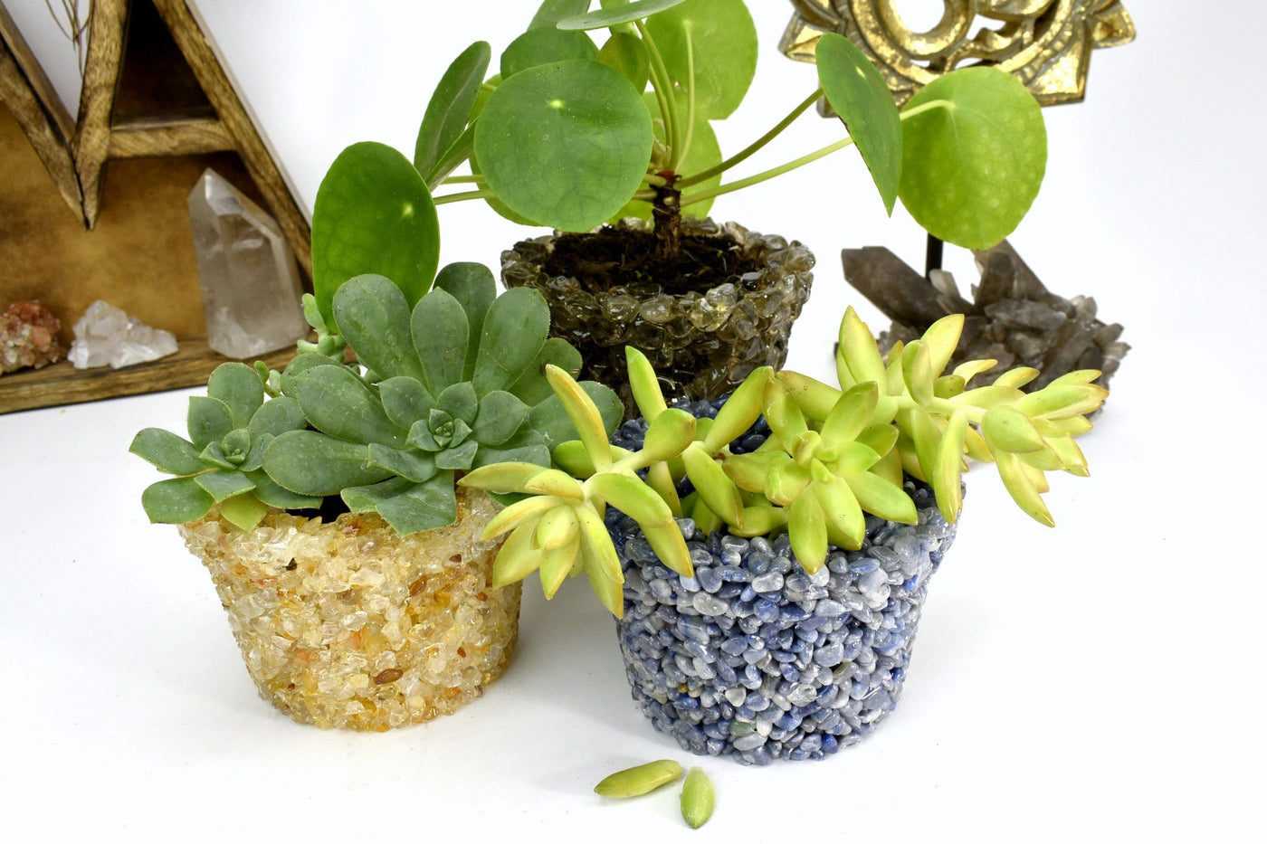 tumbled stone flower pots displayed as home decor 