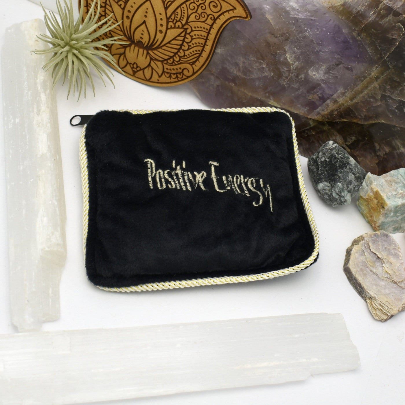 Positive Energy Pillow filled with Tumbled Stones on white background