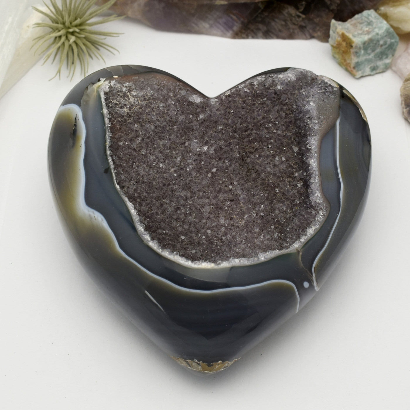 Agate Druzy Polished Heart (DOOAK-S24-18) in an alter with a white background.
