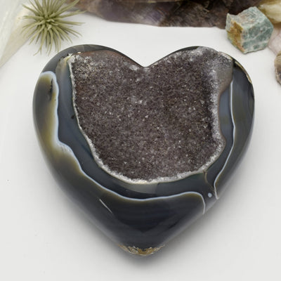 Agate Druzy Polished Heart (DOOAK-S24-18) in an alter with a white background.