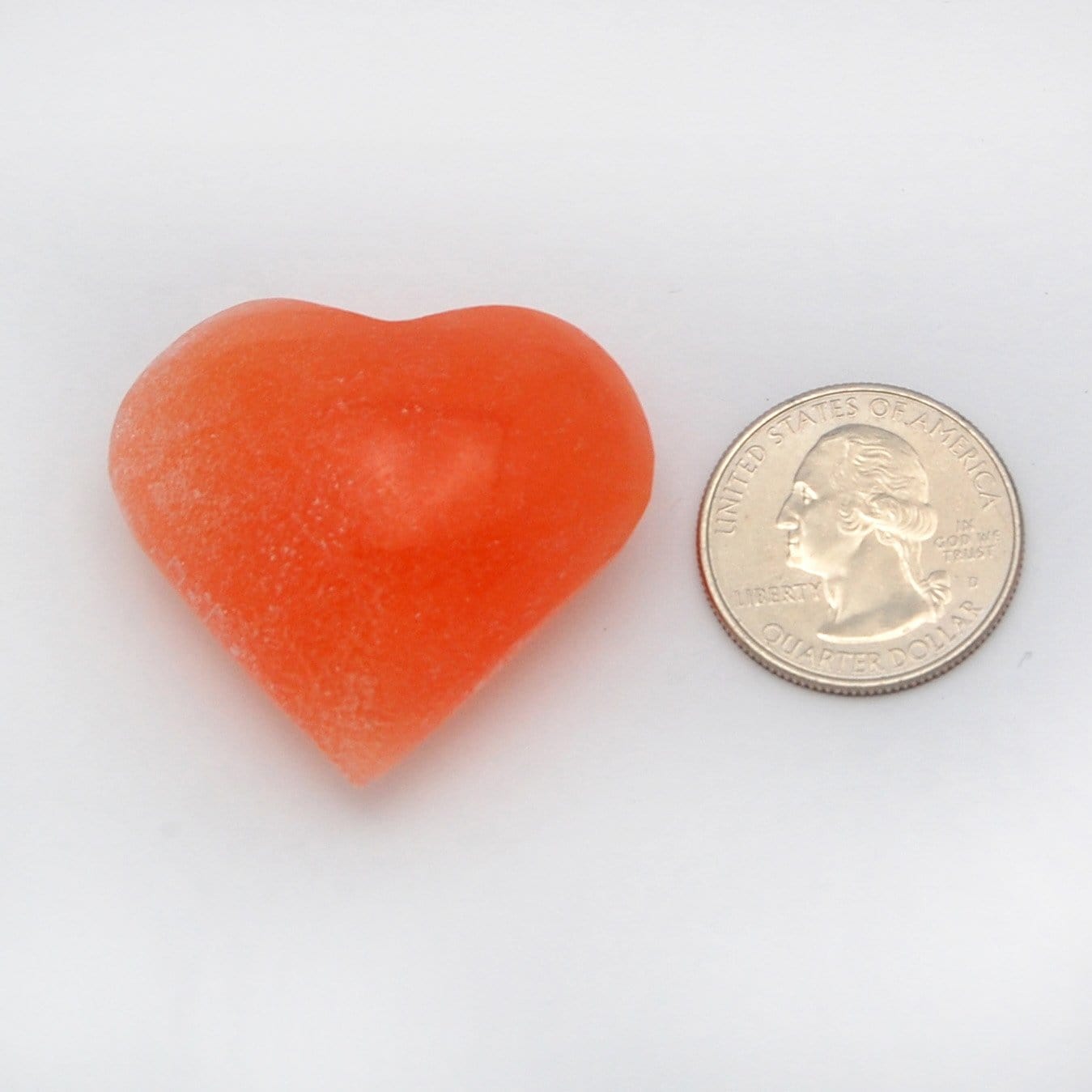 heart next to a quarter for size reference 