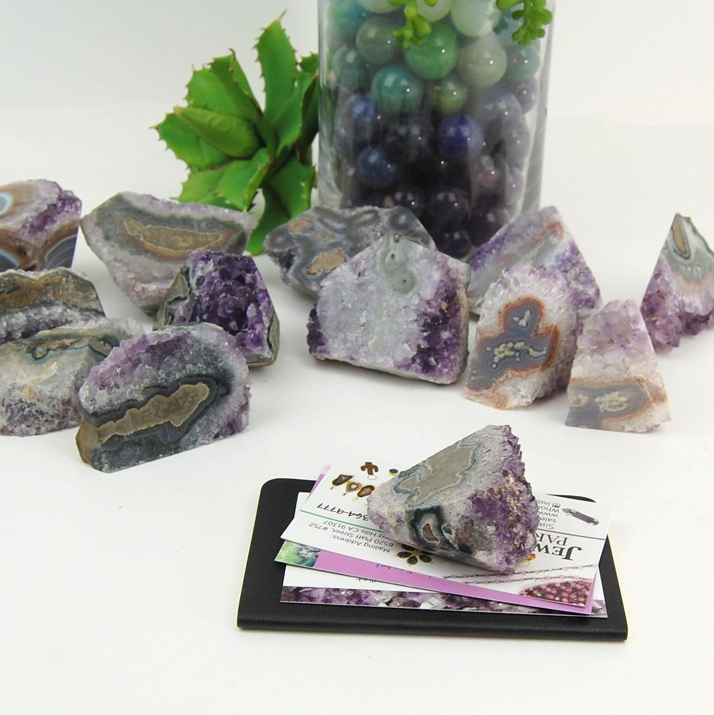 multiple Amethyst Stalactite Paper Weights to show various formations, patterns, colors, and natural inclusions