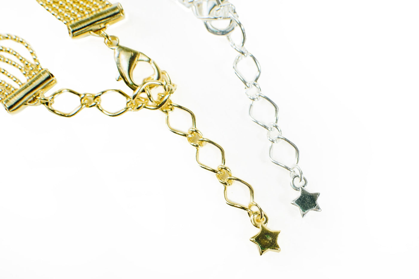 end of chain displayed to show star on the gold and silver bracelet