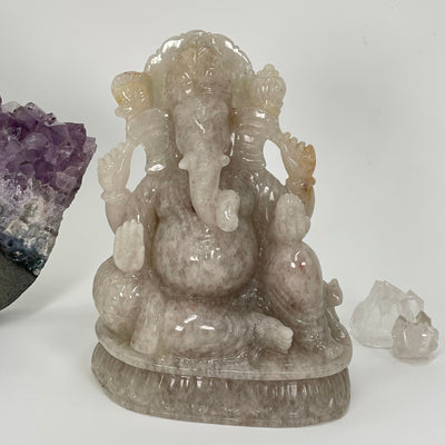 smoky quartz carved and shaped in to an elephant ganesha displayed as home decor 