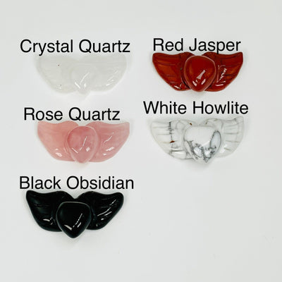 carved heart with wings gemstone available in crystal quartz, red jasper, rose quartz, white howlite and black obsidian 