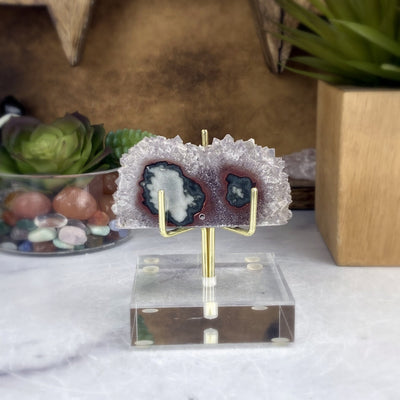 Drilled Amethyst Stalactite Double Stalactite in Acrylic Stand on White Background.