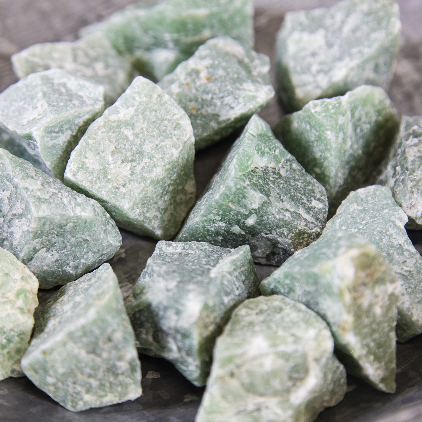 up close of the green quartz pieces to view various colors textures shapes sizes