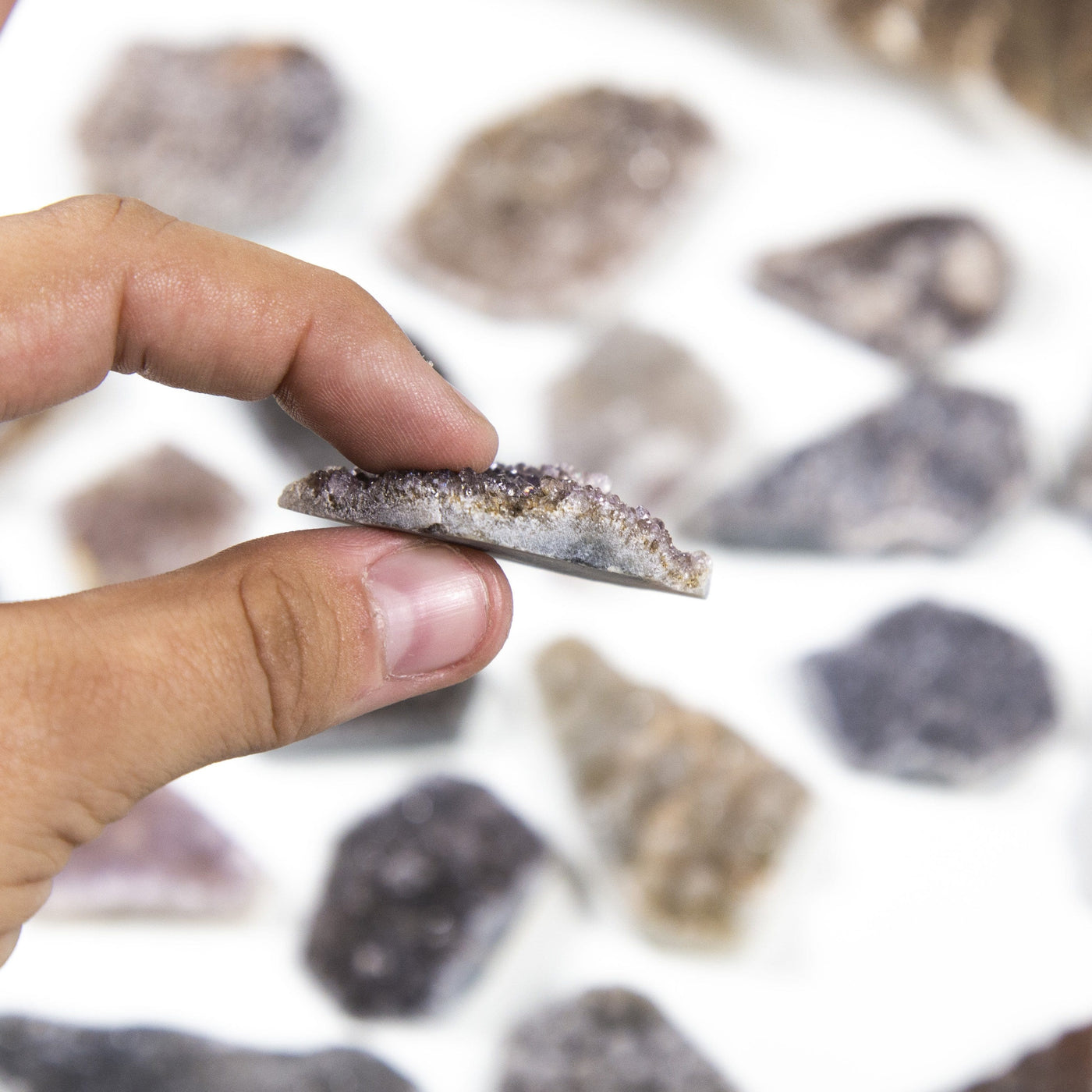 druzy cabochons with decorations in the background