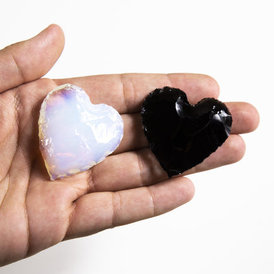 Products Opalite and Obsidian Heart Moon and Star - black and white heart s in a hand