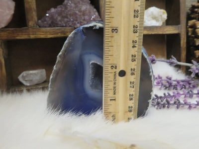 blue agate cut base with ruler for size reference