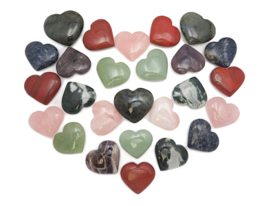  Heart Shaped Stone in various types of crystals in heart formation on white background