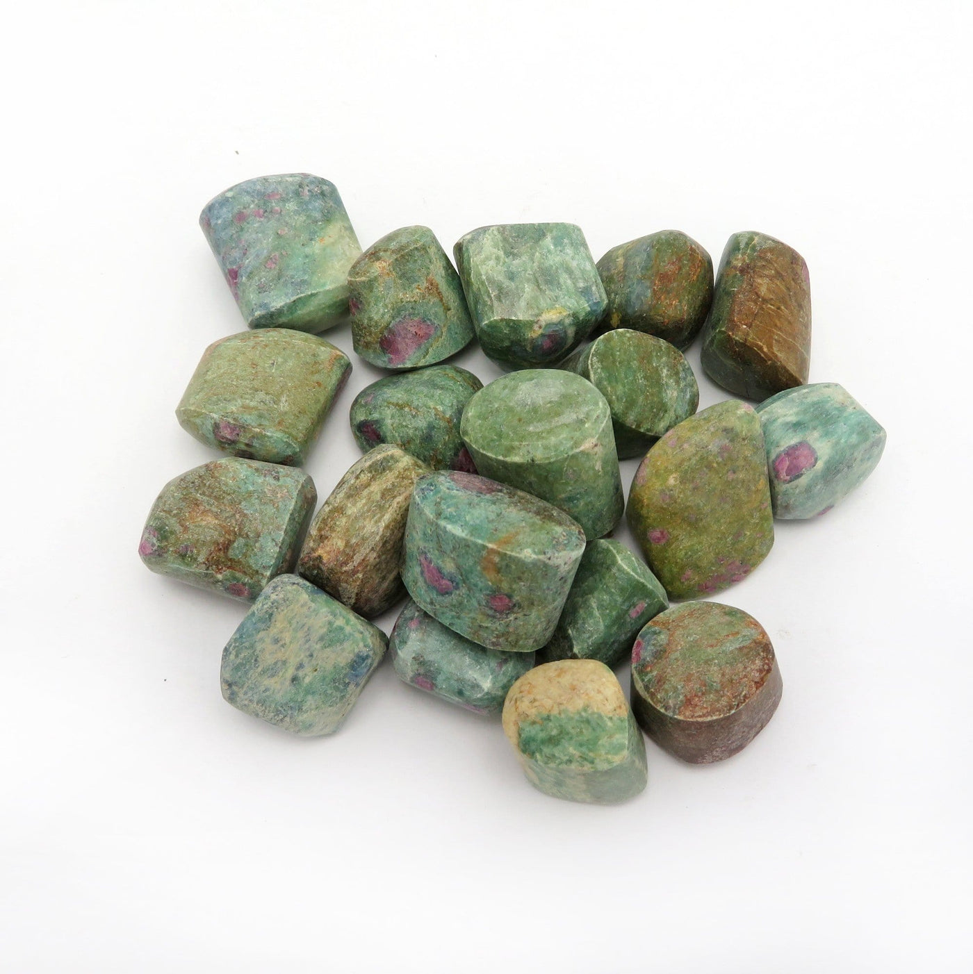 ruby fuchsite tumbled in a pile
