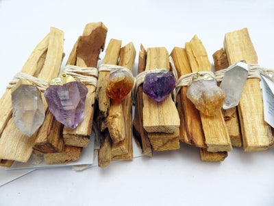 Side view Six Palo Santo Bundle with variety of pendants