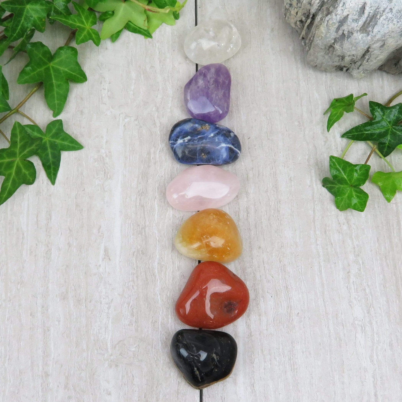  Chakra Stones Set of 7 Tumbled Stones A Quality LARGE stacked in Chakra order on a table