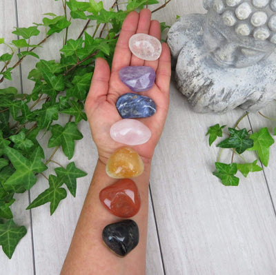  Chakra Stones Set of 7 Tumbled Stones A Quality LARGE stacked on a hand and wrist is Chakra order