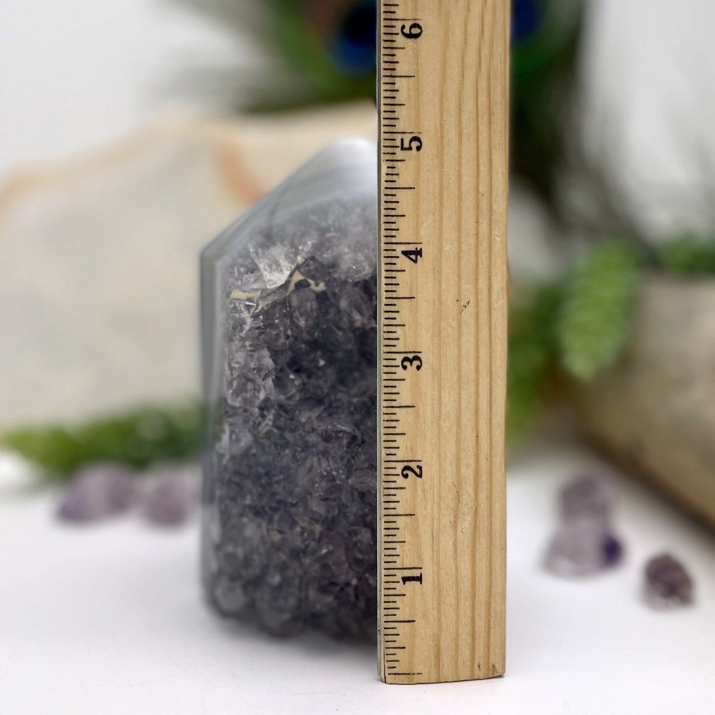 Amethyst Polished Point next to ruler for size reference