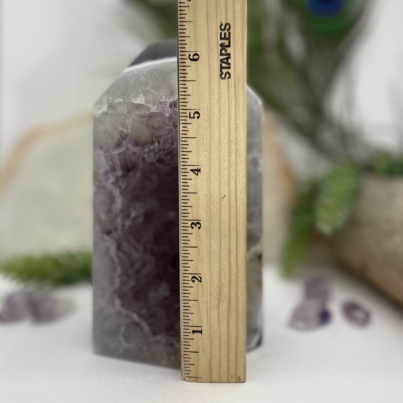 Amethyst Polished Point with ruler in front of it for size reference