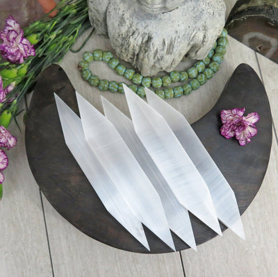 top view of Selenite Flat Double Points with decorations